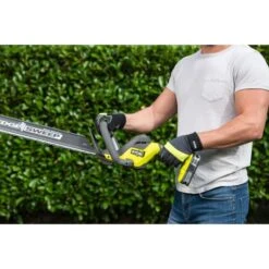 Taille Haie à Batterie RY18HTX60A125 -Construction Matériaux Magasin Photo dambiance 2 1347830