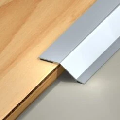 SEUIL DE 2 NIVEAUX ADHESIFS PRESTO INOX BRILLANT 10/93 -Construction Matériaux Magasin Photo dambiance 303616